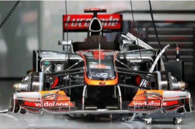Jenson Button's McLaren shows its complex internal design while sitting in the team garage before the Bahrain Grand Prix this year. Mark Thompson / Getty Images