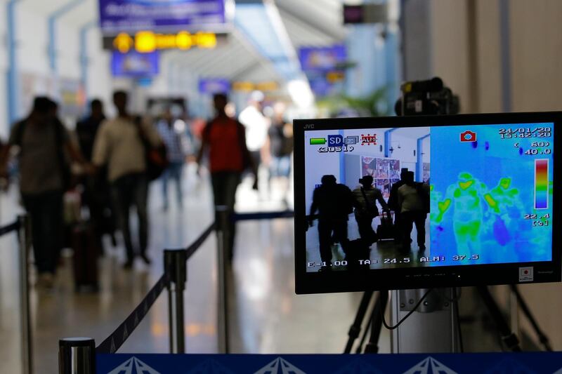 A thermal scanner monitor screen shows the temperature of arriving passengers at Bandaranaike International Airport in Colombo, Sri Lanka. EPA