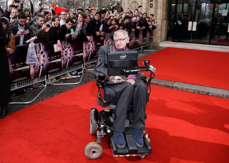 Professor Stephen Hawking poses for photographers upon arrival for the Interstellar Live show at the Royal Albert Hall in central London on March 30, 2015. Joel Ryan / Invision /AP