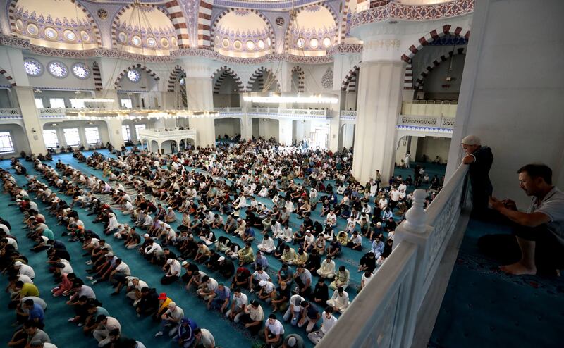 Muslims pray during Eid Al Adha celebrations at the central mosque in Bishkek, Kyrgyzstan. EPA 