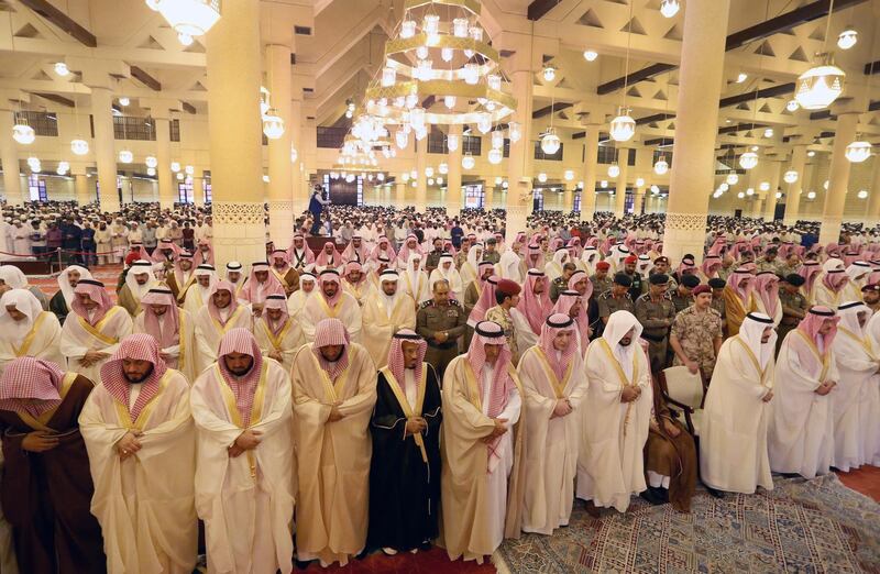 Saudi and foreign Muslims perform Eid al-Fitr prayer at the Al Masmak grand mosque of the Prince Turki bin Abdullah palace in Riyadh, Saudi Arabia. Ahmed Yosri / EPA