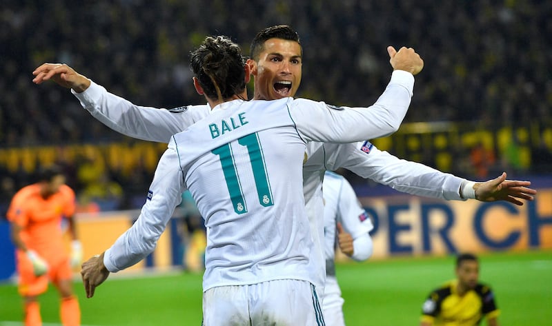Cristiano Ronaldo celebrates scoring Real Madrid's second goal in the 3-1 win over Borussia Dortmund. Martin Meissner / AP Photo