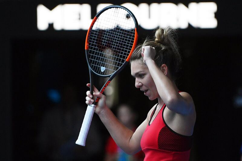epa06472657 Simona Halep of Romania celebrates after winning her women's semi final match against Angelique Kerber of Germany at the Australian Open Grand Slam tennis tournament in Melbourne, Australia, 25 January 2018.  EPA/LUKAS COCH AUSTRALIA AND NEW ZEALAND OUT