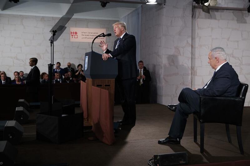 Israeli prime minister Benjamin Netanyahu listens as US president Donald Trump speaks at the Israel Museum. Evan Vucci / AP Photo