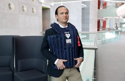 ABU DHABI , UNITED ARAB EMIRATES , OCT 2  ��� 2017 :- Jonathan Weinberg , Director of CAERvest showing the Core Body Cooling vest after the Pitch@Palace competition held at the Khalifa University in Abu Dhabi.  ( Pawan Singh / The National ) Story by Haneen Dajani