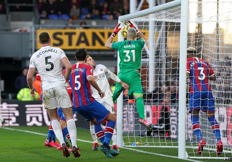 Crystal Palace goalkeeper Vicente Guaita drops the ball into his own net to score an own goal and gift three points to Sheffield United. PA