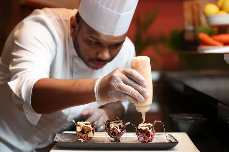 Chandika Ratnayaka, chef de cuisine at Bounty Beets in Dubai, plates up plant-based tacos for Veganuary. All photos: Chris Whiteoak / The National