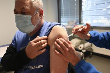 A doctor administers the Covid-19 vaccine to a man at the NHC hospital (Nouvel Hopital Civil) in Strasbourg, eastern France. AFP