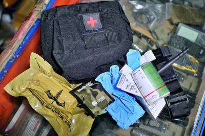 Pictured: The contents of an individual first aid kit sold at Mustafa's shop in central Kabul, including a tournique and a hemostatic dressing used to stop arterial bleeding.
Photo by Charlie Faulkner