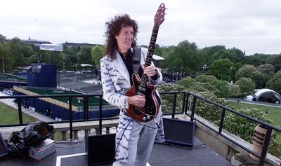 Queen's Brian May rehearsing on the roof of Buckingham Palace ahead of his performance of the national anthem, for Queen Elizabeth II's golden jubilee concert in 2002. PA Wire