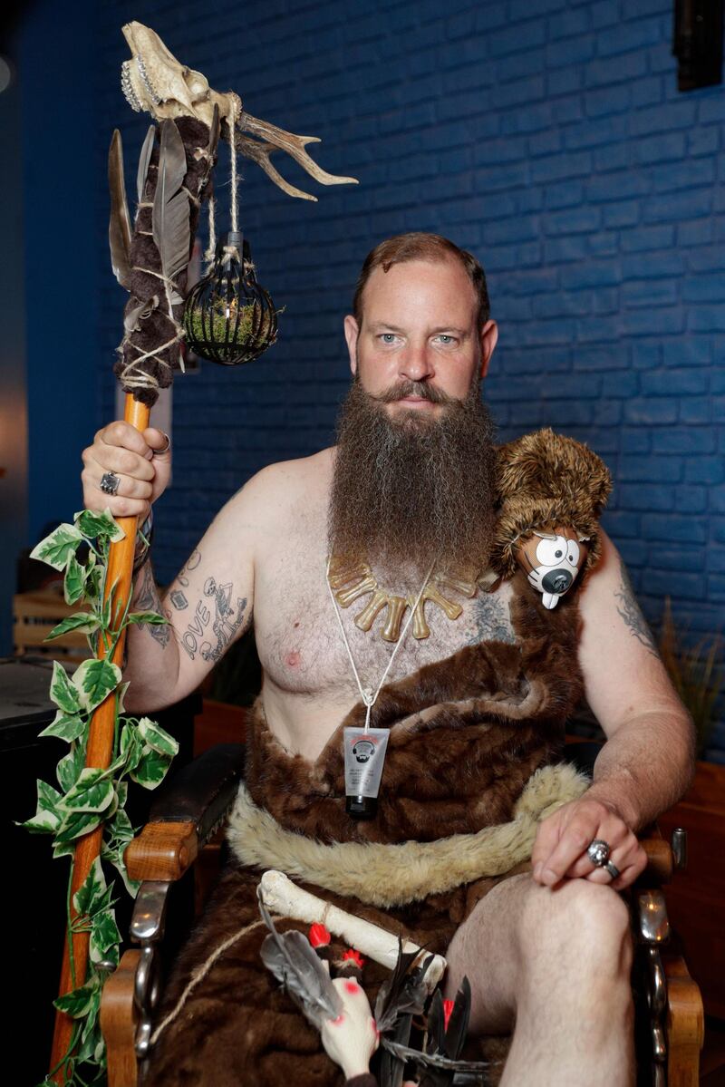 A contestant poses as he takes part in the third edition of the French Beard Championships in Paris. AFP