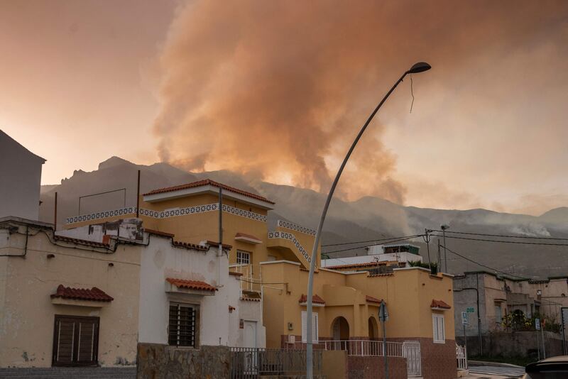 Smoke billows above the village of Arafo on the island of Tenerife. AFP