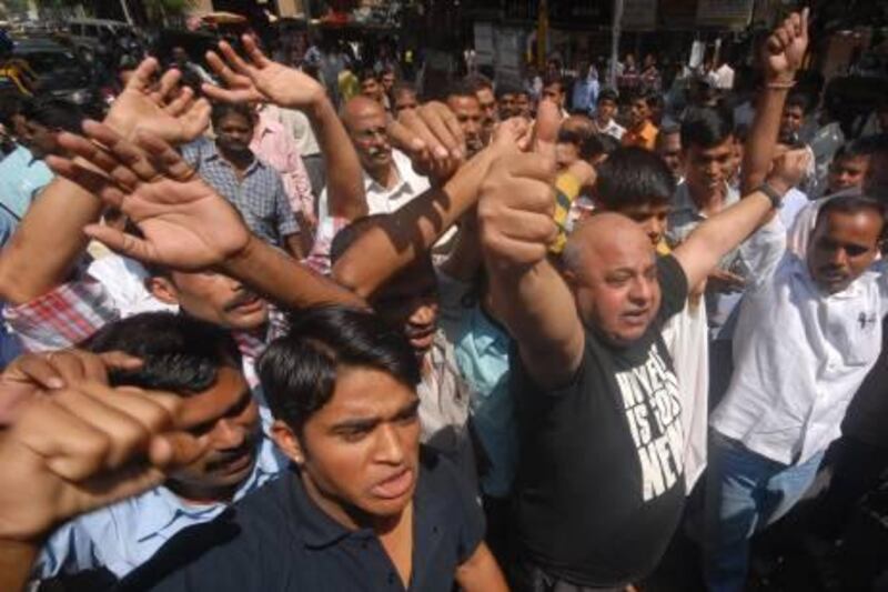 epa02594526 Indian people shout anti-Pakistan slogans outside the high court as they welcome the confirmation of the death penalty to convicted terrorist Ajmal Kasab, in Mumbai, India, 21 February 2011. The High Court in Mumbai on 21 February 2011 upheld a death sentence for the lone surviving gunman of the November 2008 terrorist attacks in the city, news reports said. Ajmal Kasab, linked to the Pakistan-based Islamist militant group Lashkar-e-Taiba, was sentenced to death by a special court on May 6 on charges including mass murder and terrorism. Justices Ranjana Desai and R V More, while confirming the death penalty, also dismissed an appeal filed by Kasab against his conviction by the trial court, the NDTV network reported.   Kasab, 23, was one of the 10 gunmen who targeted several sites in Mumbai in a three-day siege, killing 166 people including 26 foreign nationals. Under Indian law, a death sentence has to be confirmed by a High Court, then by the Supreme Court and finally approved by the president.  EPA/DIVYAKANT SOLANKI *** Local Caption ***  02594526.jpg