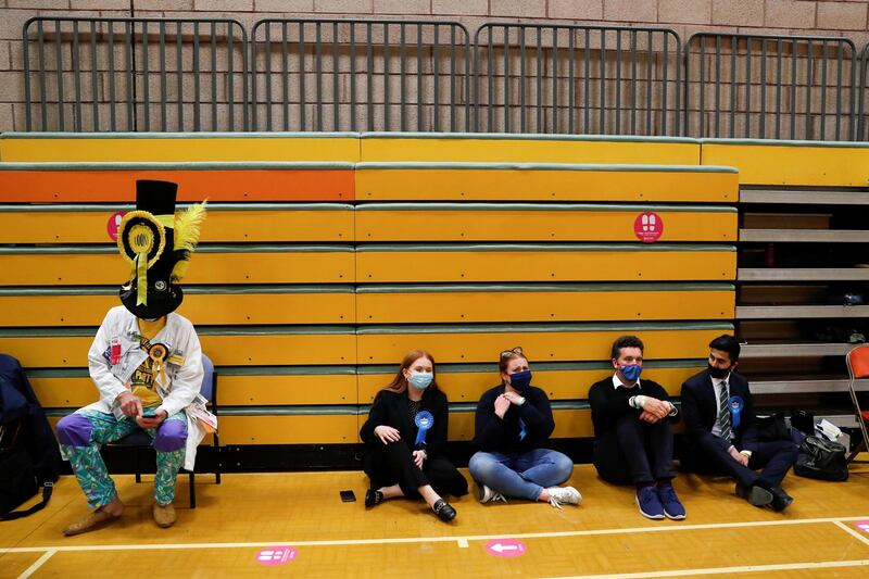 People wait as ballots are counted. Reuters