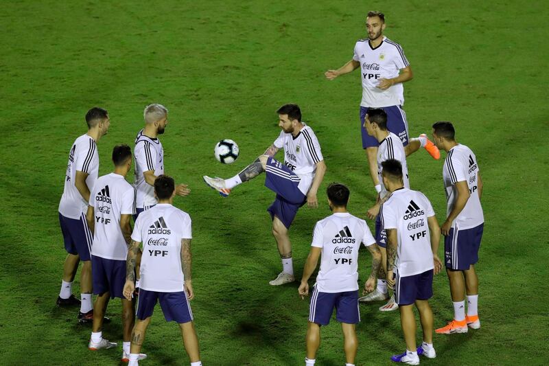 Messi controls the ball as he trains with his teammates in Salvador. AP Photo