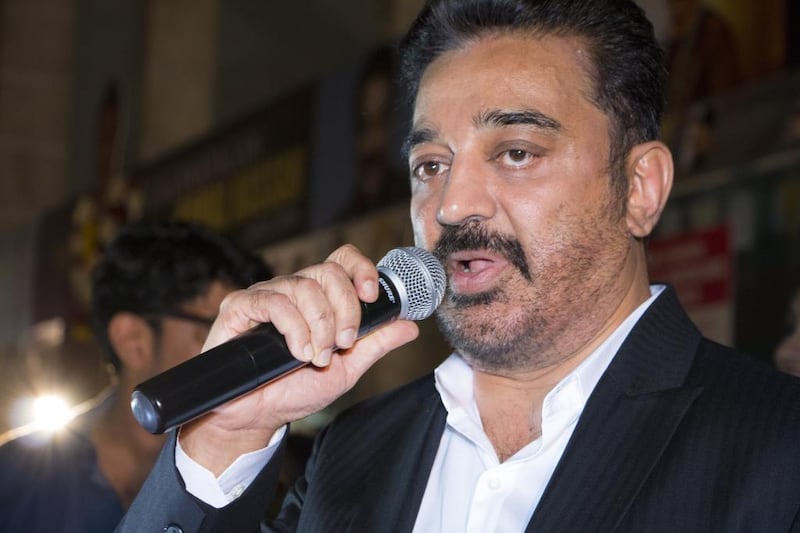 Tamil actor Kamal Haasan talks to fans at the premiere of his film 'Uttama Villain' at Golden Cinemas in Bur Dubai on June 11, 2016. Navin Khianey for The National