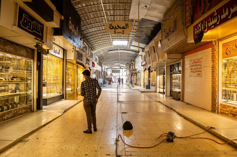 A man walks through the empty gold market during the coronavirus pandemic in Kirkuk, Iraq. On September 4, Iraq recorded 5,036 coronavirus cases, its biggest daily increase since the start of the outbreak.  The surge has prompted warnings from Iraq's health minister and WHO that the country could be on the verge of a health crisis as pressure mounts on the already strained healthcare system. Since the first case was recorded in February, Iraq has recorded 252,075 total cases and 7,359 deaths. Getty Images