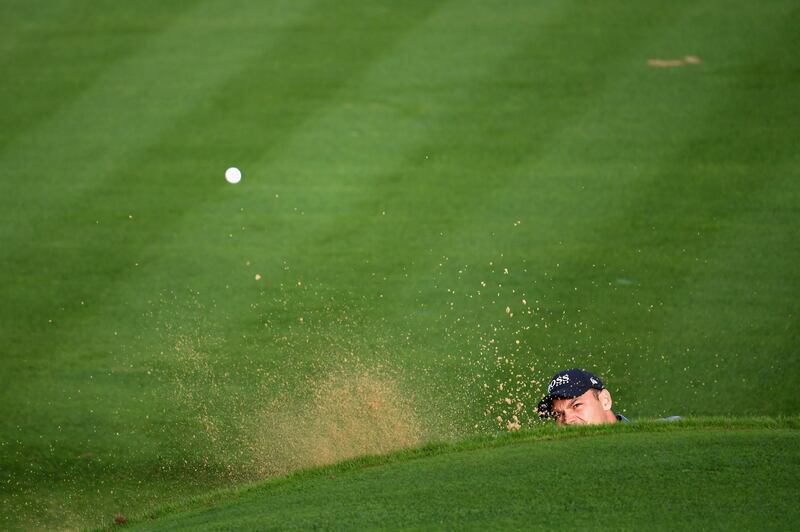 Martin Kaymer of Germany takes a shot from the bunker on hole ten during Day Two of the Omega Dubai Desert Classic at Emirates Golf Club. Getty Images