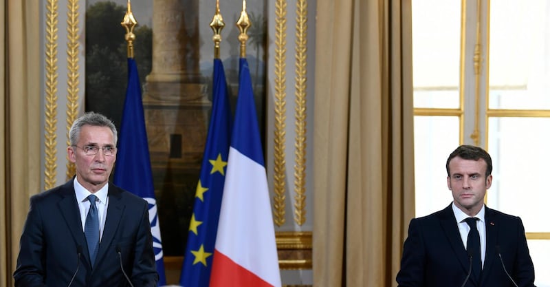 French President Emmanuel Macron, right, and NATO Secretary General Jens Stoltenberg, hold a joint press conference at the Elysee palace, Thursday, Nov.28, 2019 in Paris. French President Emmanuel Macron said the NATO needed "a wake up call" and that its leaders must have a strategic discussion about how the military alliance should work, including on improving ties with Russia. (Bertrand Guay, Pool via AP)