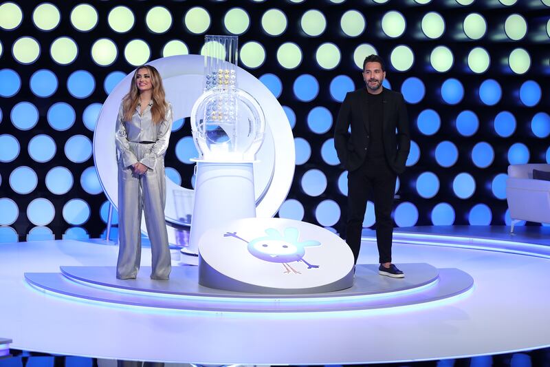 Hosts Aishwarya Ajit and Wissam Breidy during the Mahzooz live weekly draw. Courtesy: Mahzooz