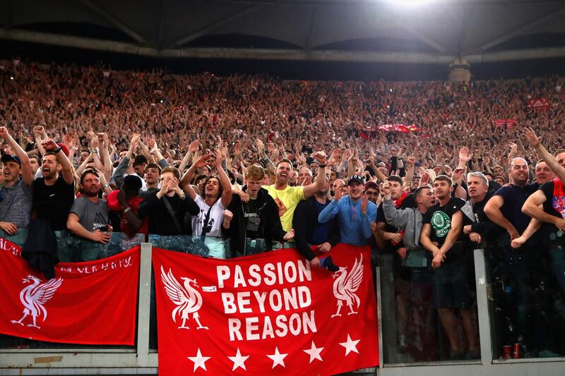 Liverpool fans celebrate after the full time whistle as Liverpool qualify for the Champions League final. They lost the second leg 4-2 to Roma at Stadio Olimpico but advanced 7-6 on aggregate. Julian Finney/Getty Images