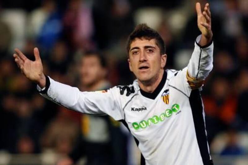 Valencia's Pablo Hernandez reacts during their Spanish first division soccer match against Espanyol at the Mestalla Stadium in Valencia January 2, 2011. REUTERS/Heino Kalis (SPAIN - Tags: SPORT SOCCER)
Picture Supplied by Action Images *** Local Caption *** 2011-01-02T231040Z_01_HJK10_RTRIDSP_3_SOCCER-SPAIN.jpg