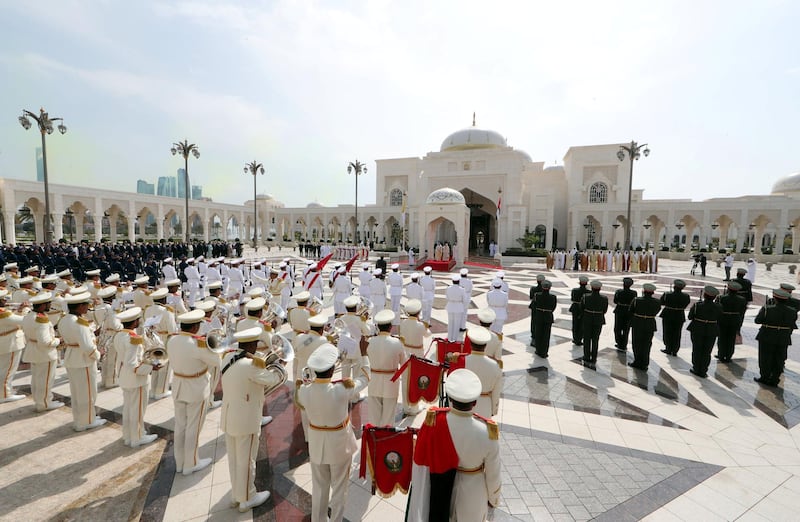 An honour guard salutes the pontiff in the courtyard of the palace. Reuters