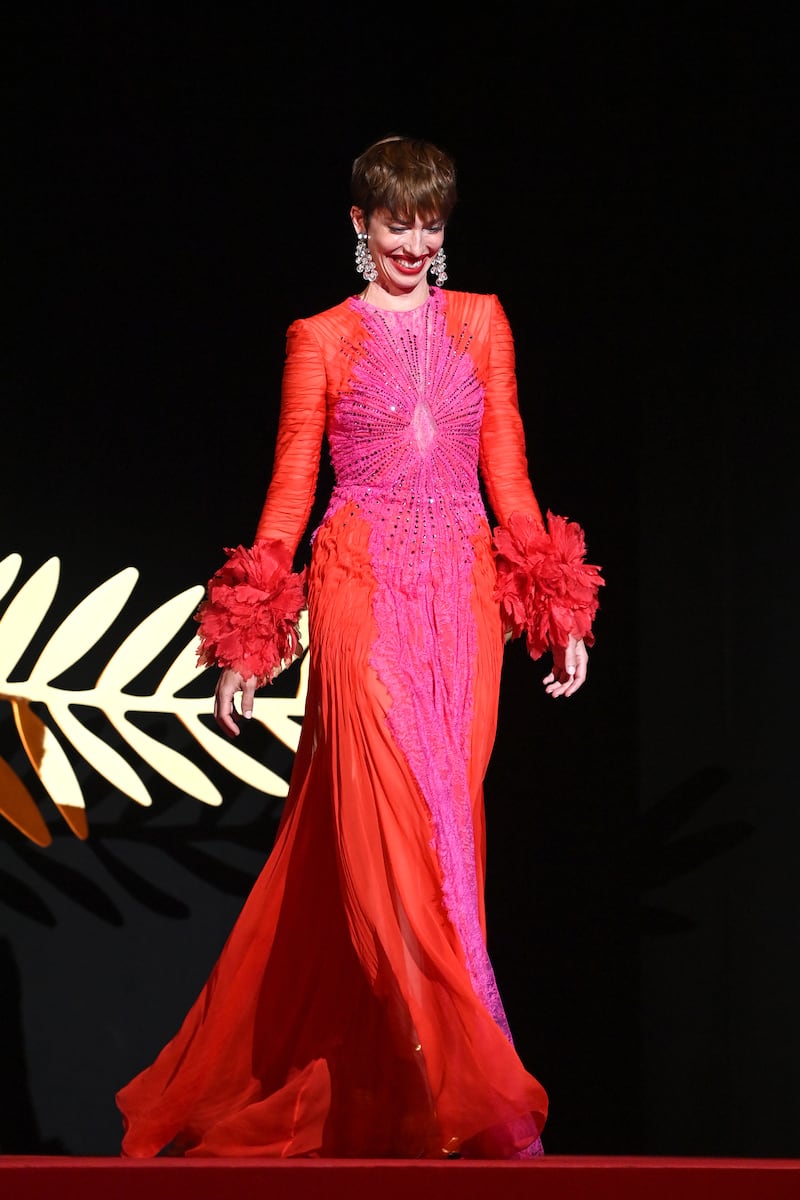 Jury member Rebecca Hall, in Gucci, arrives on stage during the opening ceremony. Getty Images