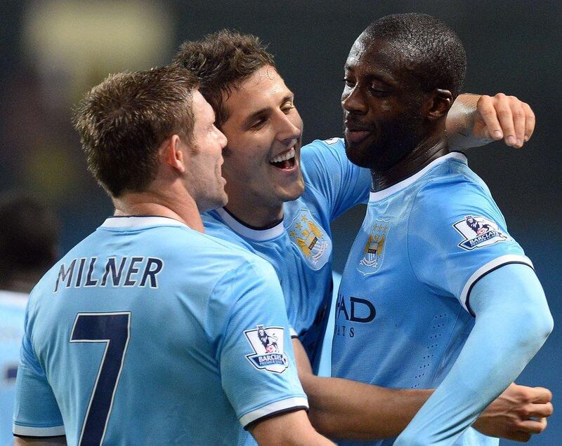 Yaya Toure, right, and Stevan Jovetic scored for a new-look Manchester City line-up. Andrew Yates / AFP