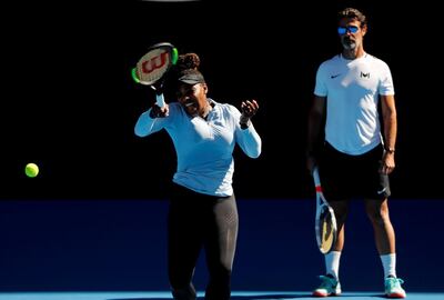 Tennis - Australian Open - Melbourne Park, Melbourne, Australia - January 13, 2019-Serena Williams of the U.S. and her coach Patrick Mouratoglou at a practice.   REUTERS/Kim Kyung-Hoon