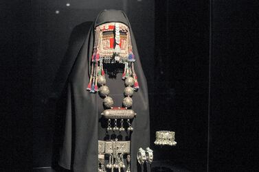 DUBAI, UNITED ARAB EMIRATES -A jewelry ensemble, headpiece, necklace, bangles and waist belt on display at the Hidden Treasures, a look at early 20th century Saudi Arabia jewelry, show how diverse the different regions fashion was. Leslie Pableo for The National