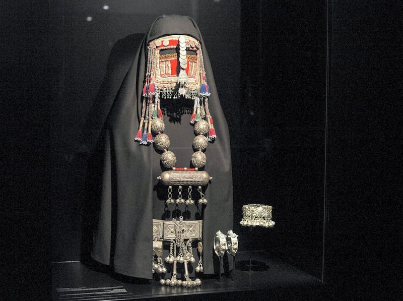 DUBAI, UNITED ARAB EMIRATES -A jewelry ensemble, headpiece, necklace, bangles and waist belt on display at the Hidden Treasures, a look at early 20th century Saudi Arabia jewelry,  show how diverse the different regions fashion was. Leslie Pableo for The National
