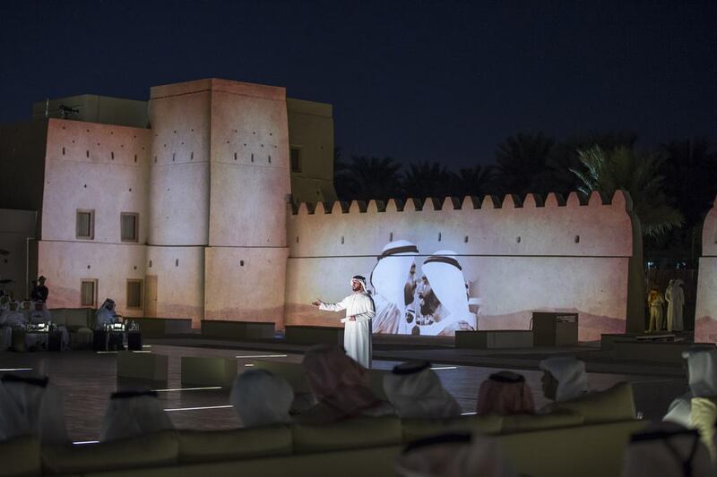 Saif Al Mansouri recites a poem during the reopening of Qasr Al Muwaiji, in Al Ain. Mohamed Al Hammadi / Crown Prince Court - Abu Dhabi