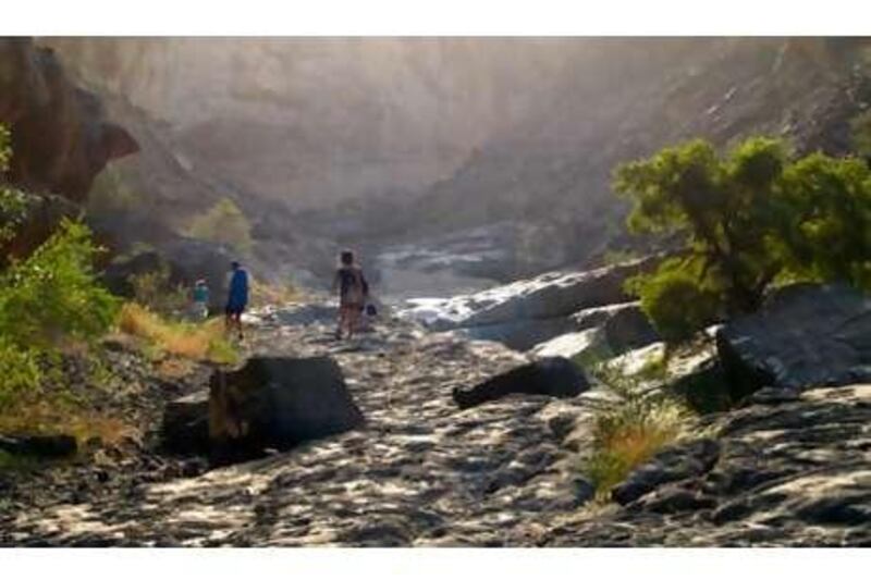 Wadi Dhum, Oman, is a 500km round trip from the Mezyad border, with a 30-minute trek at the destination to take hikers across a dramatic wadi bed to reach the larger water pools.