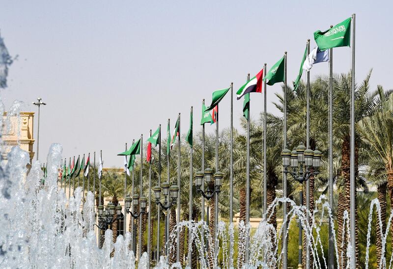 The flags of the Kingdom of Saudi Arabia and other Gulf Cooperation Council member states such as the United Arab Emirates, Oman and Bahrain wave at the hotel where the meeting of the Group of Twenty members' finance ministers and central bank governors is set to take place in Riyadh, Saudi Arabia. EPA