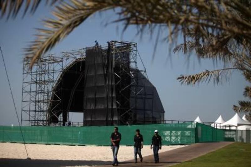 United Arab Emirate - Abu Dhabi - October 25th, 2010:  Works assemble tents stages and projector screens for the events that will be held on the corniche during F1.  (Galen Clarke/The National)