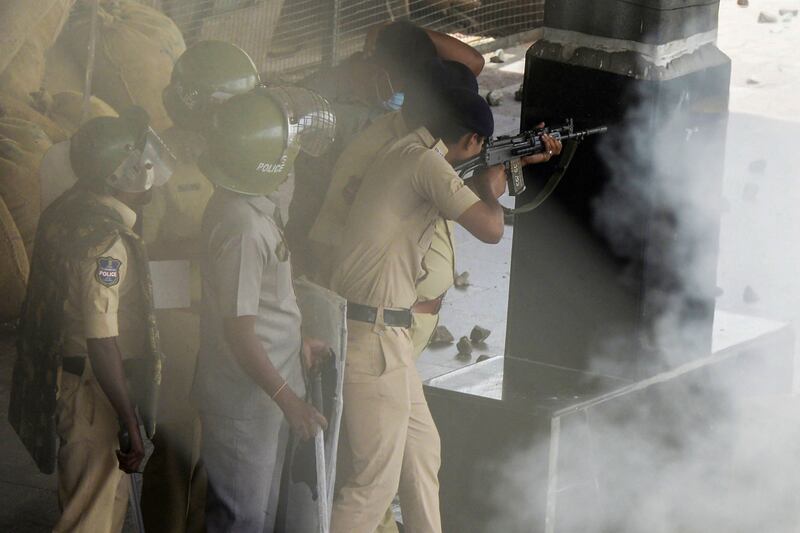 Policemen open fire to disperse protesters in Secunderabad. AFP