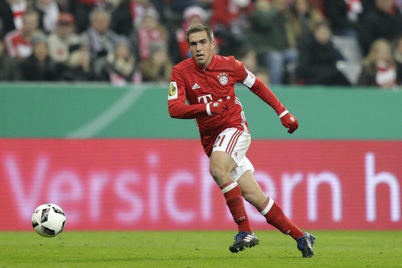 Bayern Munich's Philipp Lahm controls the ball during the German Cup match between Bayern Munich and Wolfsburg at the Allianz Arena in Munich, Germany, Tuesday, February 7, 2017. Matthias Schrader / AP Photo 