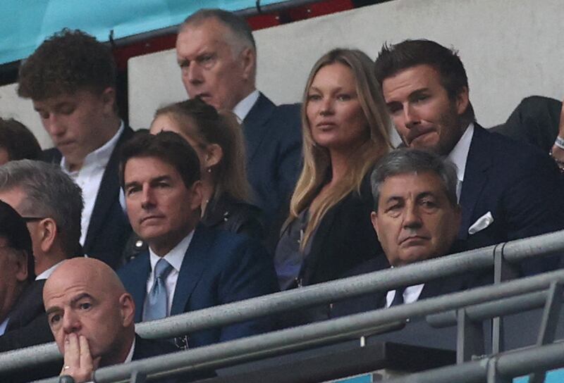 US actor Tom Cruise, English model Kate Moss and English footballer David Beckham are seen during the Euro 2020 final football match between Italy and England.