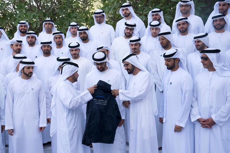 DUBAI, UNITED ARAB EMIRATES - November 03, 2018: HH Lt General Sheikh Saif bin Zayed Al Nahyan, UAE Deputy Prime Minister and Minister of Interior (R), HH Sheikh Mohamed bin Rashid Al Maktoum, Vice-President, Prime Minister of the UAE, Ruler of Dubai and Minister of Defence (3rd R), HH Sheikh Mohamed bin Zayed Al Nahyan, Crown Prince of Abu Dhabi and Deputy Supreme Commander of the UAE Armed Forces (4th R) and HH Sheikh Hamdan bin Mohamed Al Maktoum, Crown Prince of Dubai, attend a reception for the KhalifaSat engineering team, at Al Zabeel Palace.  

( Hamad Al Kaabi / Crown Prince Court - Abu Dhabi )
---