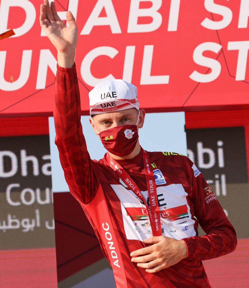 Race leader Tadej Pogacar of UAE Team Emirates on the podium after the second stage of the UAE Tour on Monday, February 22, 2021. AFP