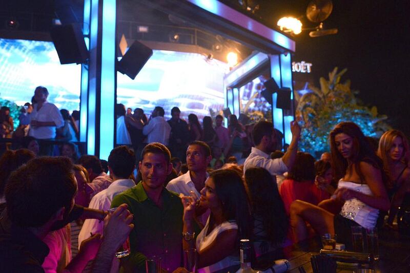 Lebanese drink and dance in Sky Bar night club in Beirut, Lebanon.  Kaveh Kazemi /Getty Images