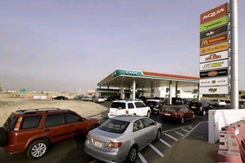 Vehicles que up for petrol at a ENOC petrol station in Mirdiff on Monday, June 06, 2011 in Dubai, United Arab Emirates. Photo: Charles Crowell for The National