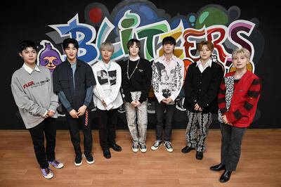 This picture taken on April 29, 2021 shows members of the K-pop boy band Blitzers posing for a photo at a rehearsal studio in Seoul. Thirty teenagers, thousands of hours of training, dozens of shattered dreams: it all comes to a head next week when the Blitzers will be launched into the cut-throat K-pop market, hoping to become the next BTS. - TO GO WITH SKorea-music-social-entertainment-Kpop,FOCUS by Kang Jin-kyu
 / AFP / Jung Yeon-je / TO GO WITH SKorea-music-social-entertainment-Kpop,FOCUS by Kang Jin-kyu
