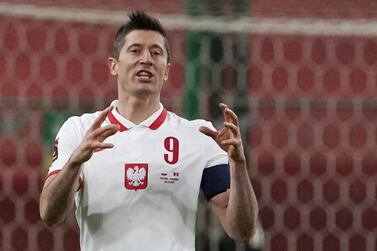 Poland's Robert Lewandowski celebrates scoring against Andorra in a World Cup qualifier. Reuters