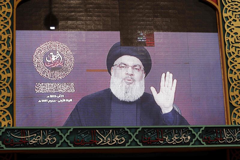 A speech by the Lebanese Shiite Muslim Hezbollah movement leader Hasan Nasrallah is transmitted on a large screen in the Lebanese capital Beirut's southern suburbs on August 31, 2019.  Nasrallah said today his movement's response to a recent drone attack on the group's Beirut stronghold had been "decided", adding that Israel "must pay a price" for the assault.
The alleged Israeli drone attack took place on August 25. 
 / AFP / ANWAR AMRO
