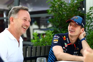 MELBOURNE, AUSTRALIA - MARCH 21: Oracle Red Bull Racing Team Principal Christian Horner and Max Verstappen of the Netherlands and Oracle Red Bull Racing talk in the Paddock during previews ahead of the F1 Grand Prix of Australia at Albert Park Circuit on March 21, 2024 in Melbourne, Australia. (Photo by Mark Thompson / Getty Images)