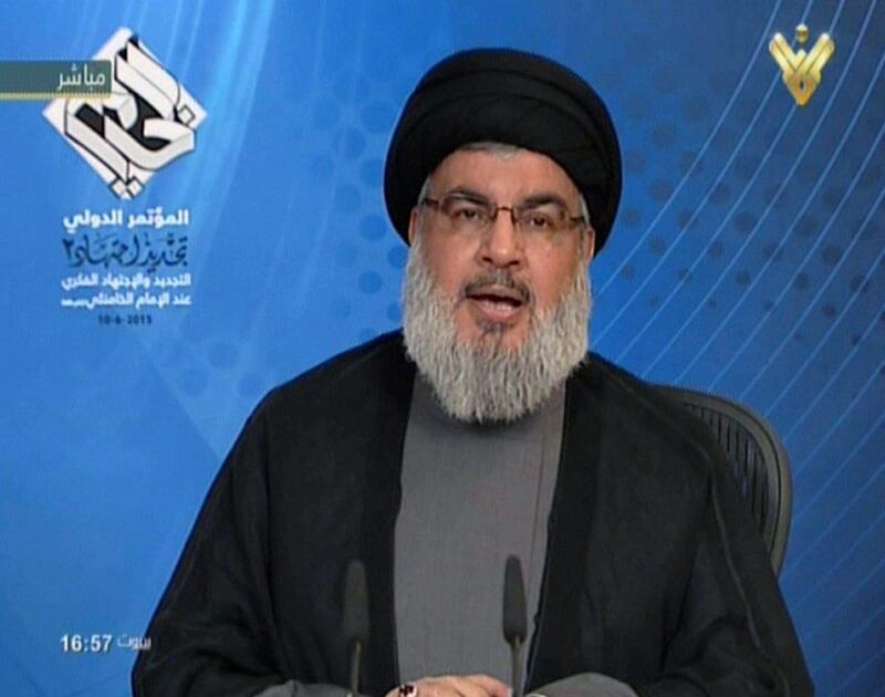 Hassan Nasrallah, the head of Hizbollah, is pictured here on June 10, 2015, giving a televised address from an undisclosed location in Lebanon. During the address Mr Nasrallah announced that the powerful Shiite movement had begun to fight ISIL. Al Manar/Handout/AFP Photo 

