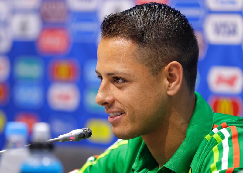 FILE - A Wednesday, June 28, 2017, file photo of  Javier Hernandez speaking during a news conference at the Fisht Stadium in Sochi, Russia.  Hernandez is heading back to the Premier League with West Ham. The London club said Thursday, July 20, 2017,  it has agreed terms with Bayer Leverkusen for the transfer of Hernandez, who was previously at Manchester United from 2010 to 2015. (AP Photo/Sergei Grits, File)