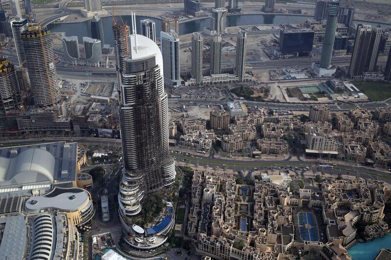 Skyscraper fires like the blaze that struck the 63-storey luxury hotel in Dubai on New Year’s Eve, swiftly turning it into a towering inferno, are not rare. The New Year’s Eve tower fire in Dubai has raised new issues about the safety of exterior sidings put on high-rise buildings. Jon Gambrell / AP Photo